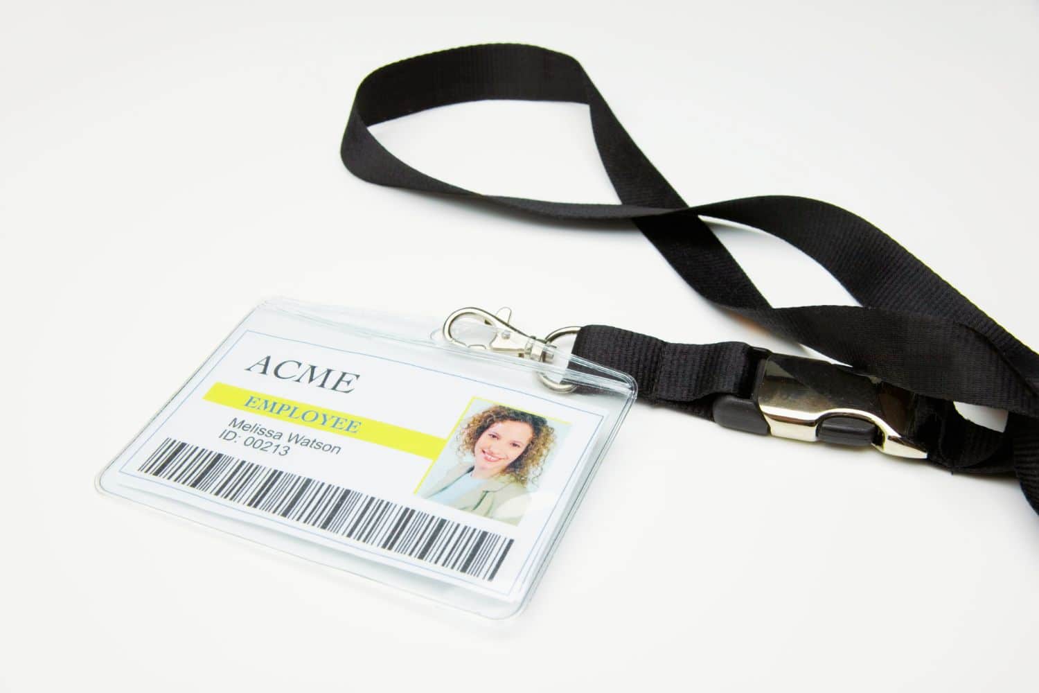 Badge employé ACME avec cordon noir